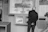 A man observes a museum display of model airplanes.