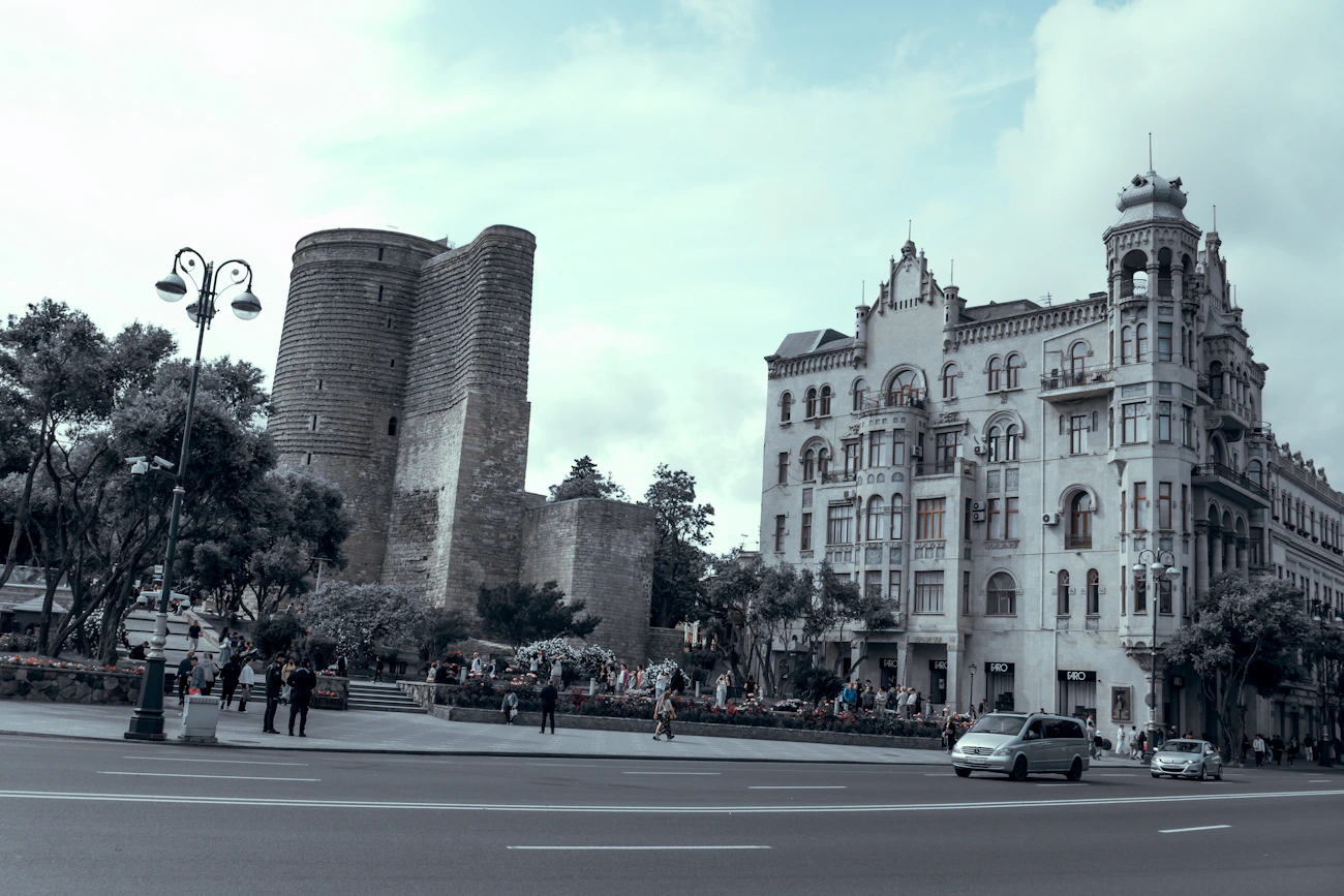 Historic stone buildings and Maiden Tower in Baku Old City, Azerbaijan