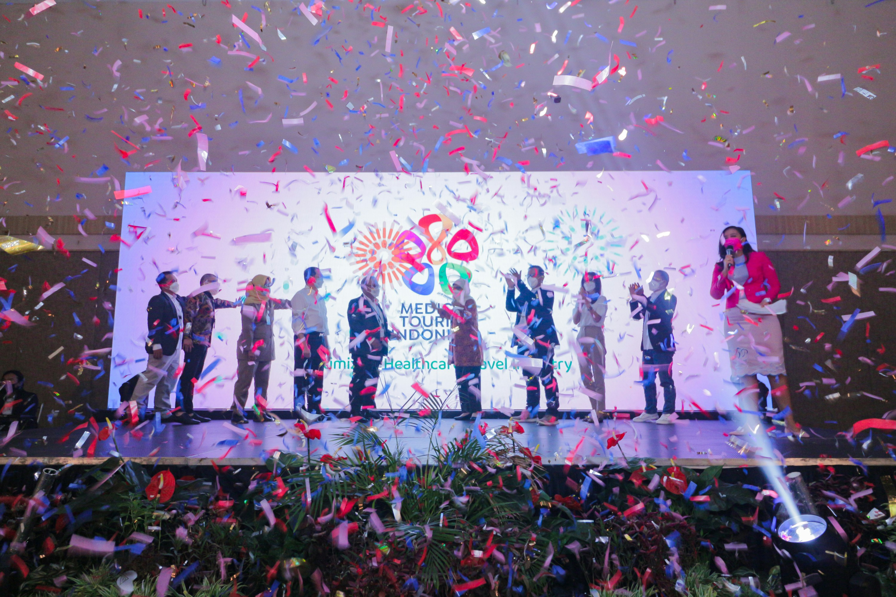 Corporate team celebrating digital transformation success