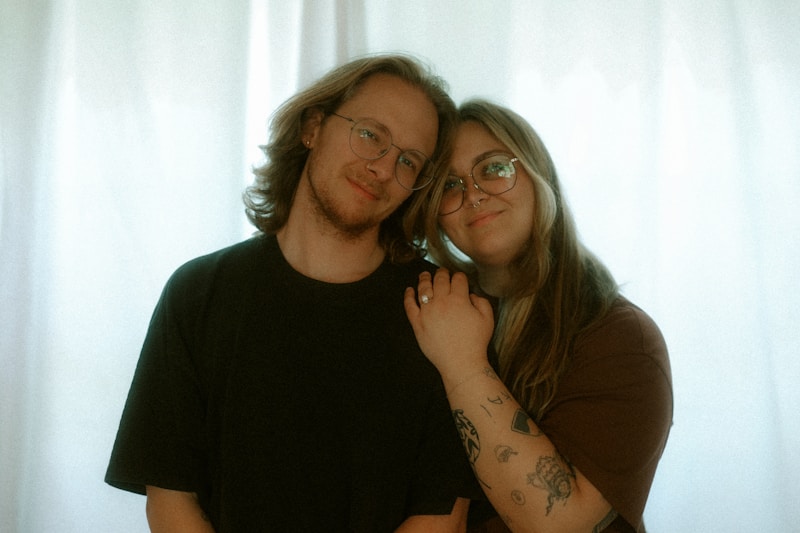 Stylish gay couple intimate pose