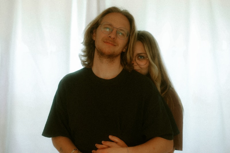 Romantic curtain embrace