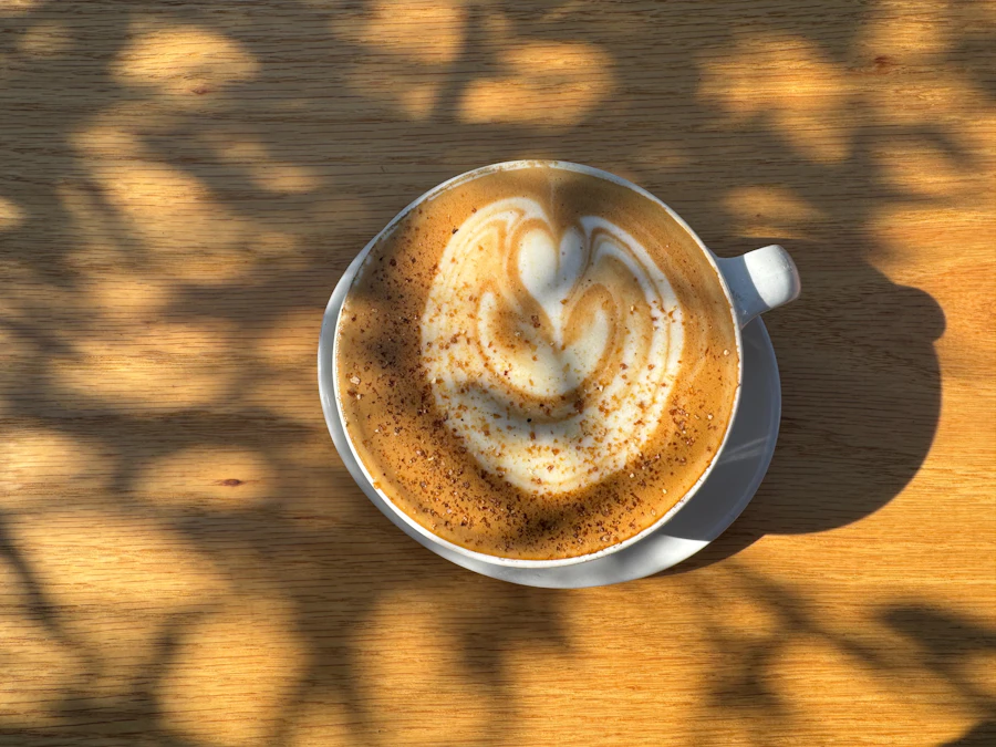 Coffee cup with latte art on a wooden table