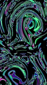 Abstract swirl of vibrant colors on black.