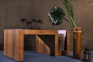 A wooden desk with decorative items on display.