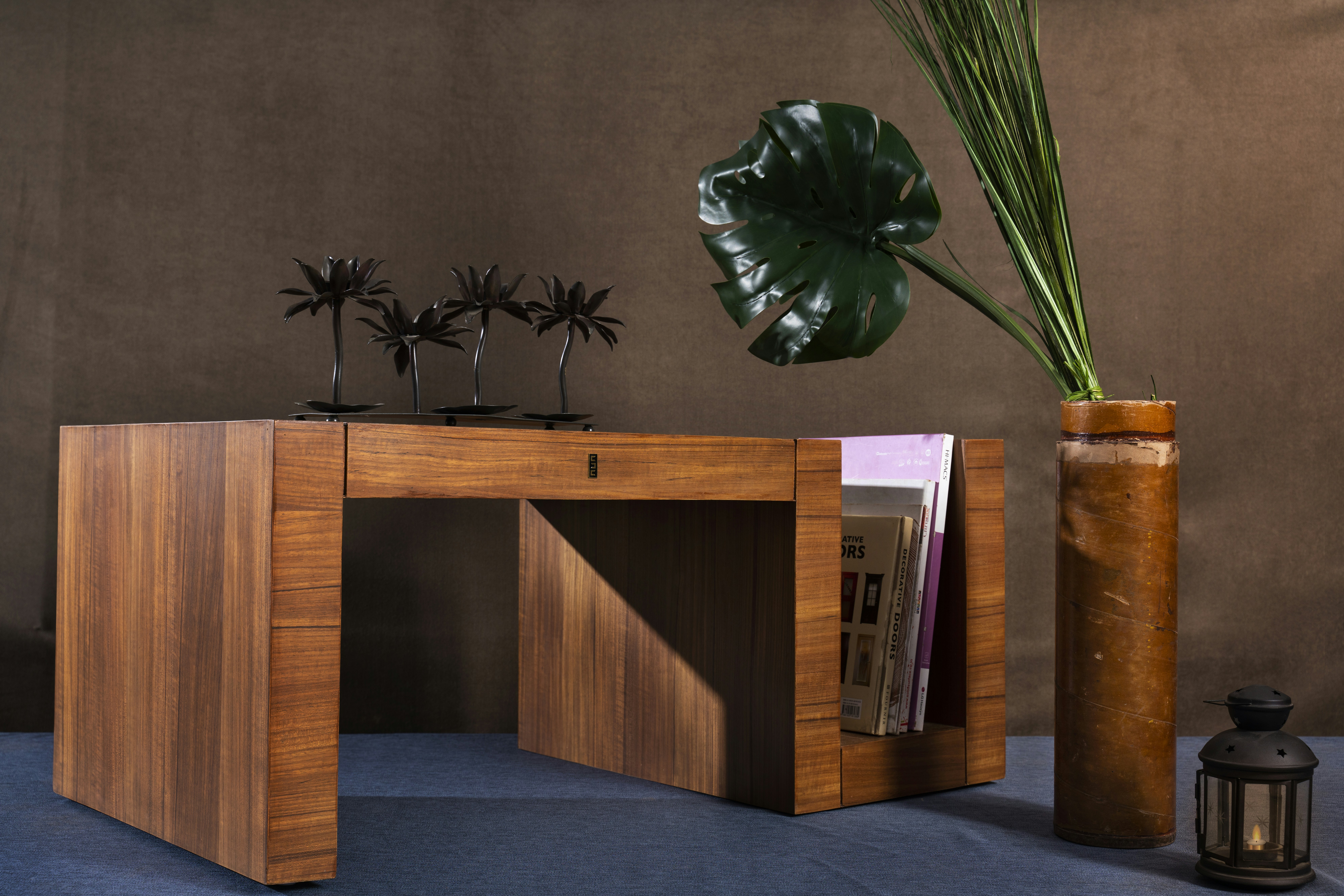 A wooden desk with decorative items on display.