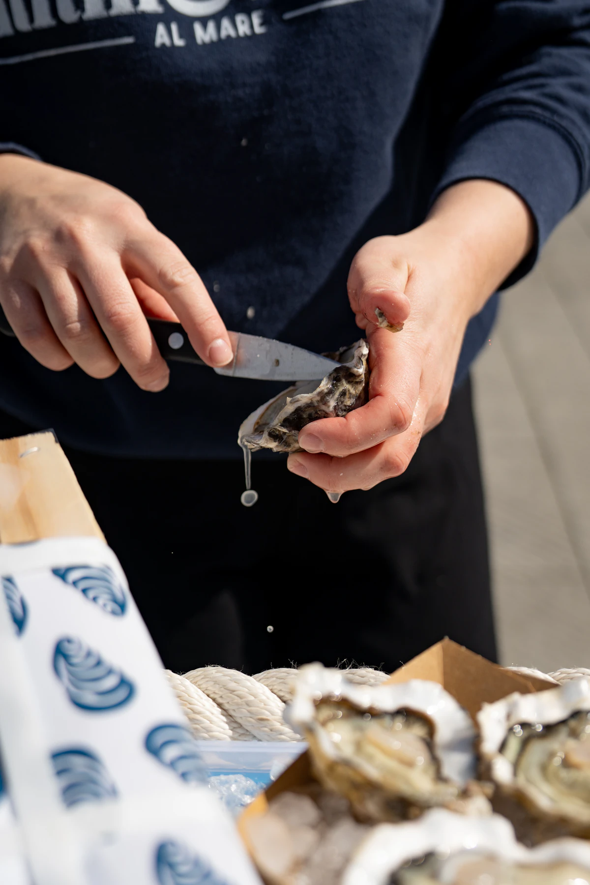 Close view of oysters and lemon on crushed ice