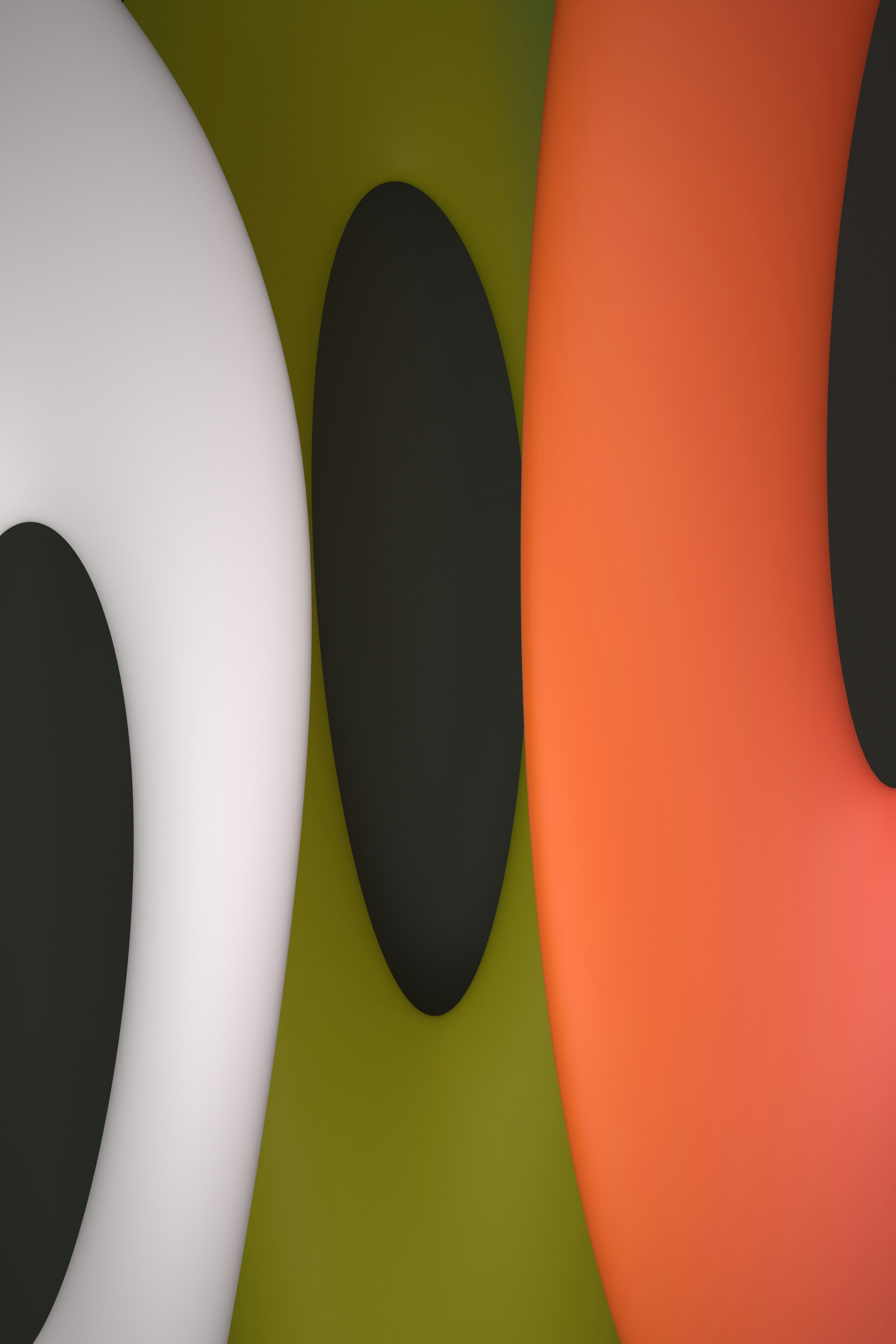 Colorful abstract shapes with dark oval cutouts.