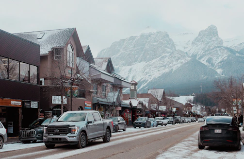 A street in the mountains with buildings.
