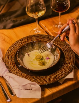 Fine dining: a person is eating soup.