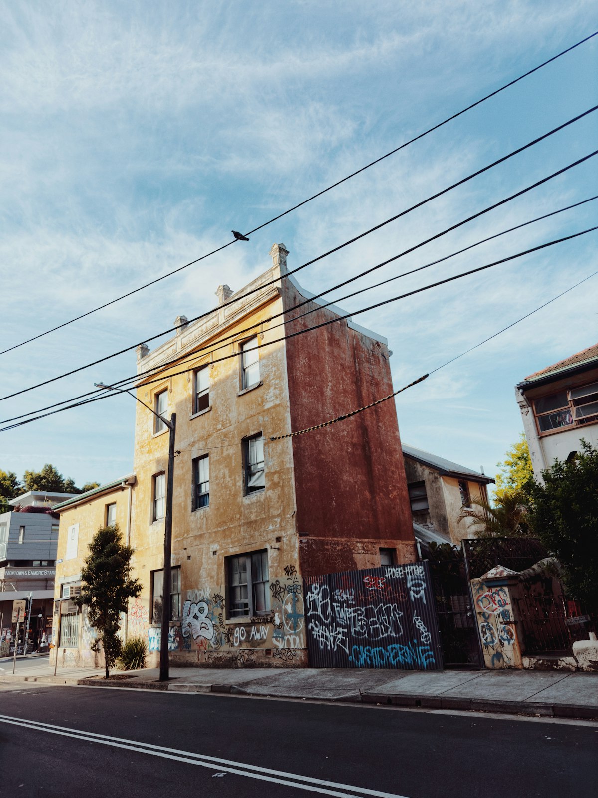 Newtown Sydney — a building adorned with colourful graffiti under a blue sky on King Street