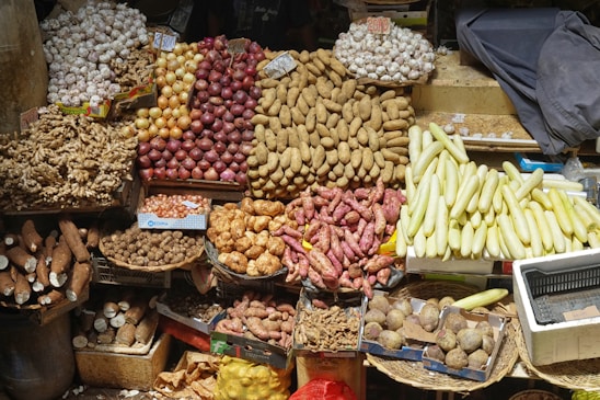 A colorful market stall displays a variety of fresh produce.