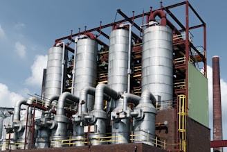 An industrial plant with towers and pipes.