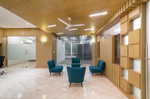 A modern office reception area with comfortable seating.
