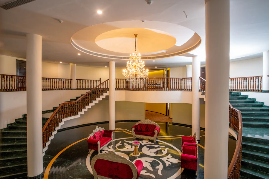 Elegant hotel lobby with a grand staircase, India