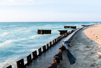 A beautiful beach with ocean waves crashing.