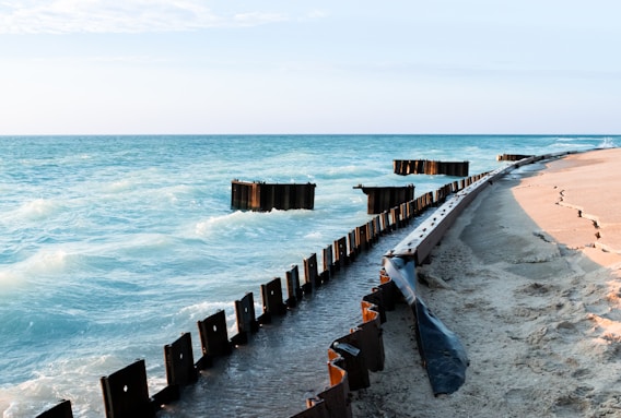 A beautiful beach with ocean waves crashing.