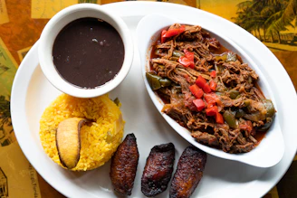 A plate of delicious caribbean food.