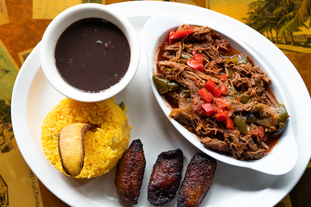 A plate of delicious caribbean food.