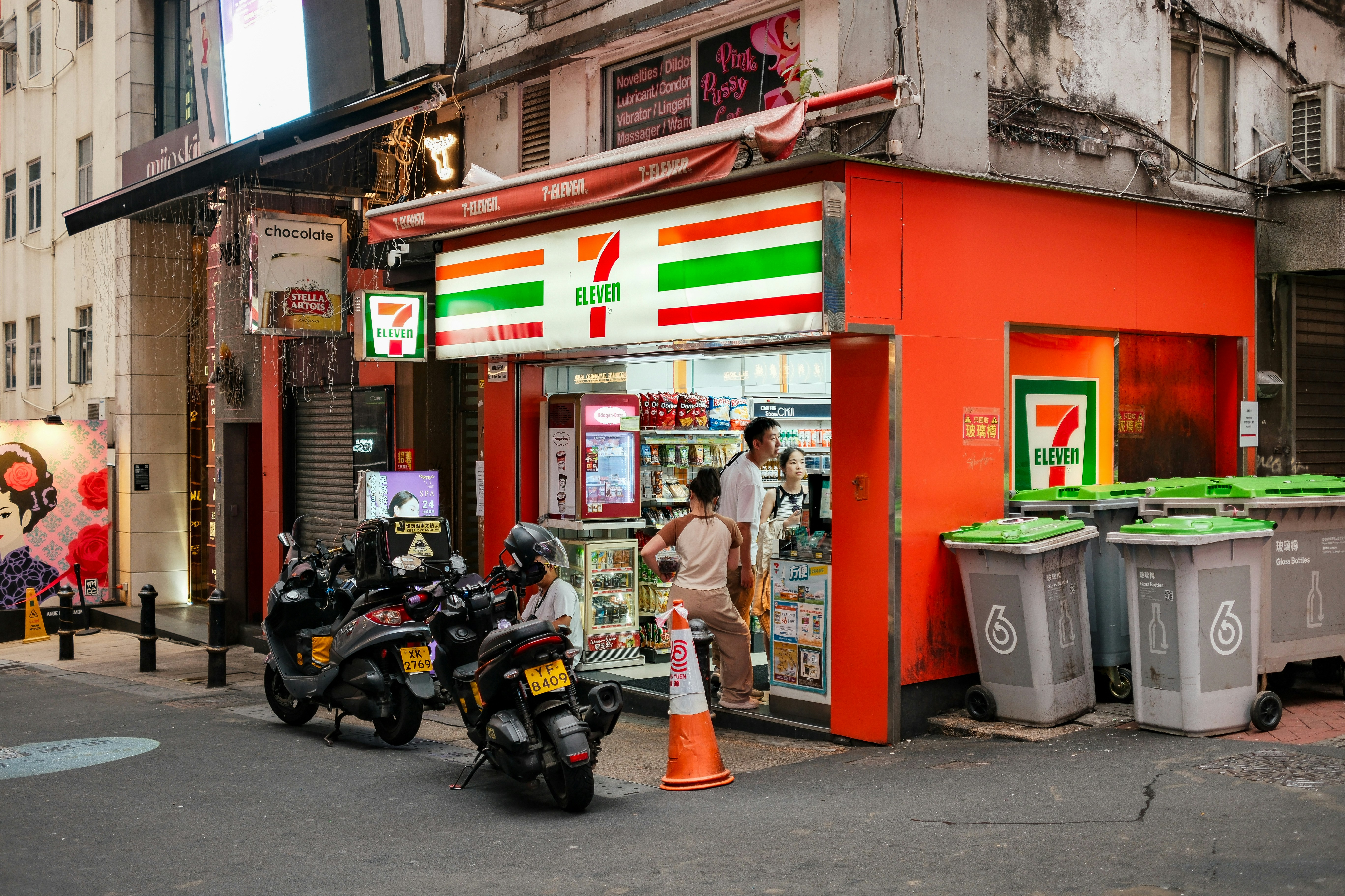 A 7-eleven store on a city street.