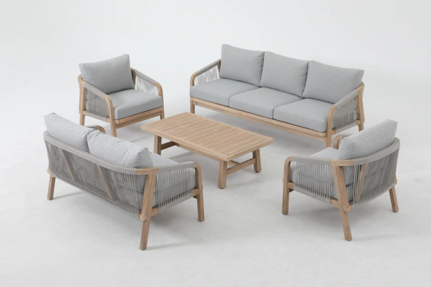 Outdoor furniture set arranged on a white background.