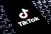 Tiktok logo on a keyboard.