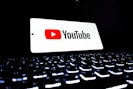 Youtube logo displayed on a keyboard.