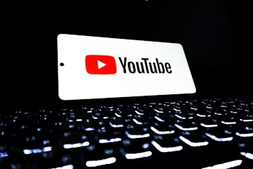 YouTube logo on keyboard — best YouTube thumbnail downloader comparison