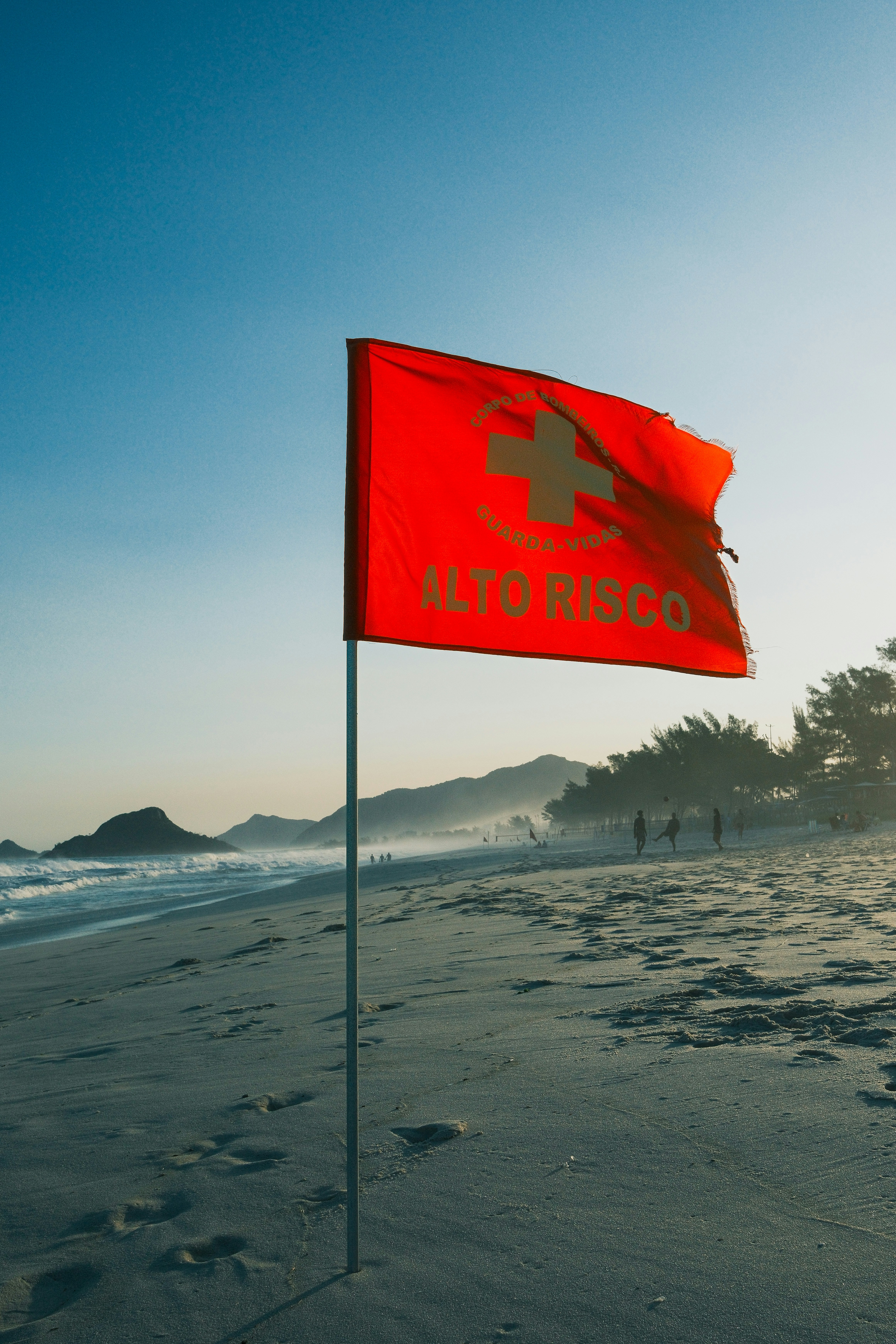 High-risk warning flag on a beach.