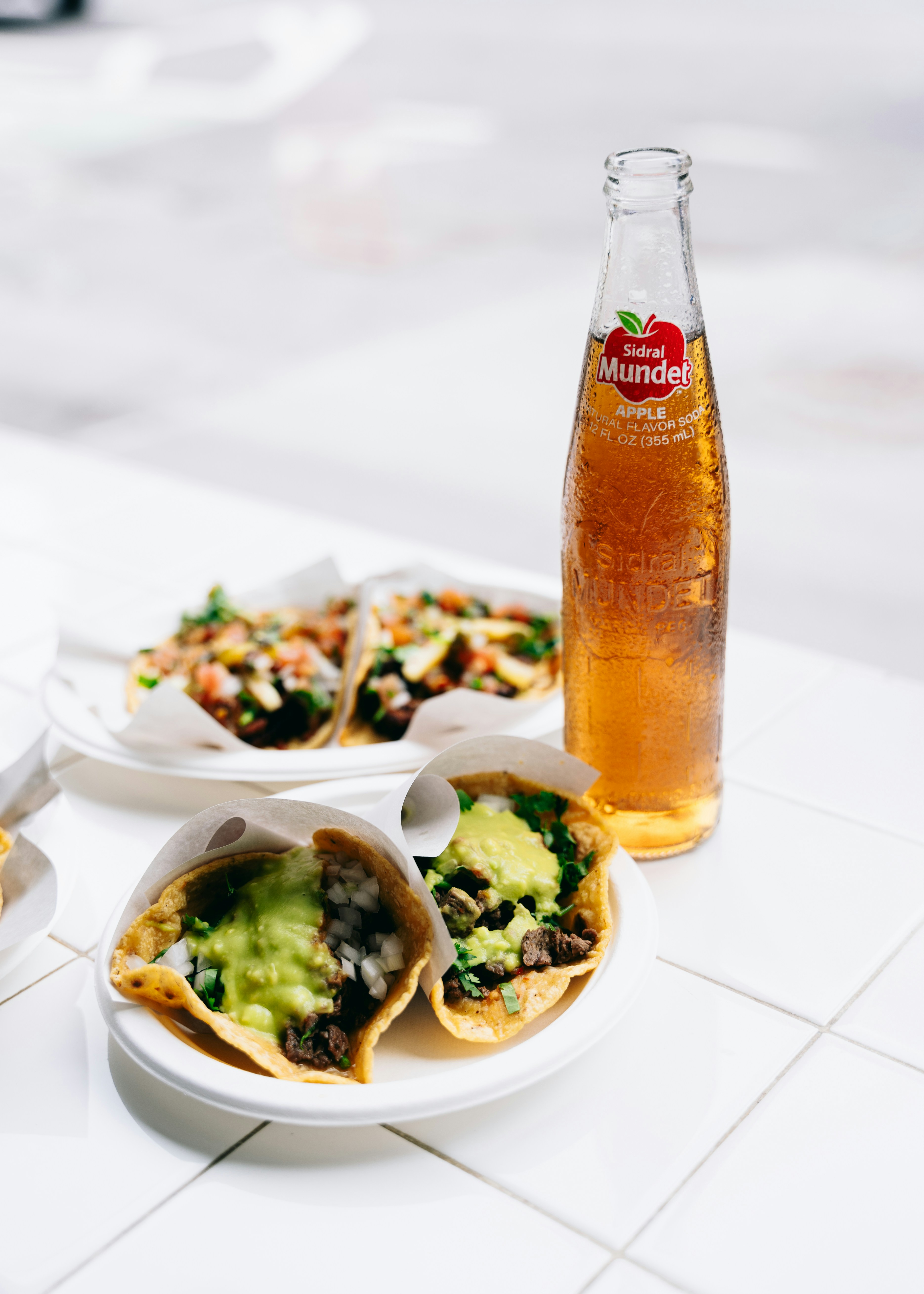 Tacos and apple cider complete a delicious meal.