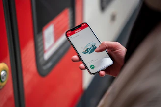 A person uses a smartphone for a transaction