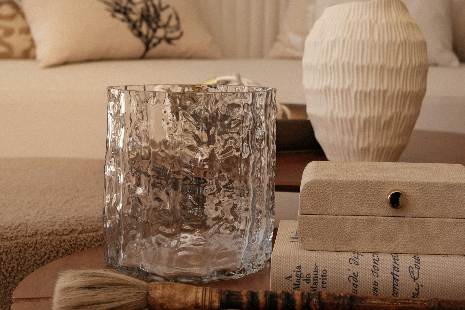 Neutral home decor with various textured items.