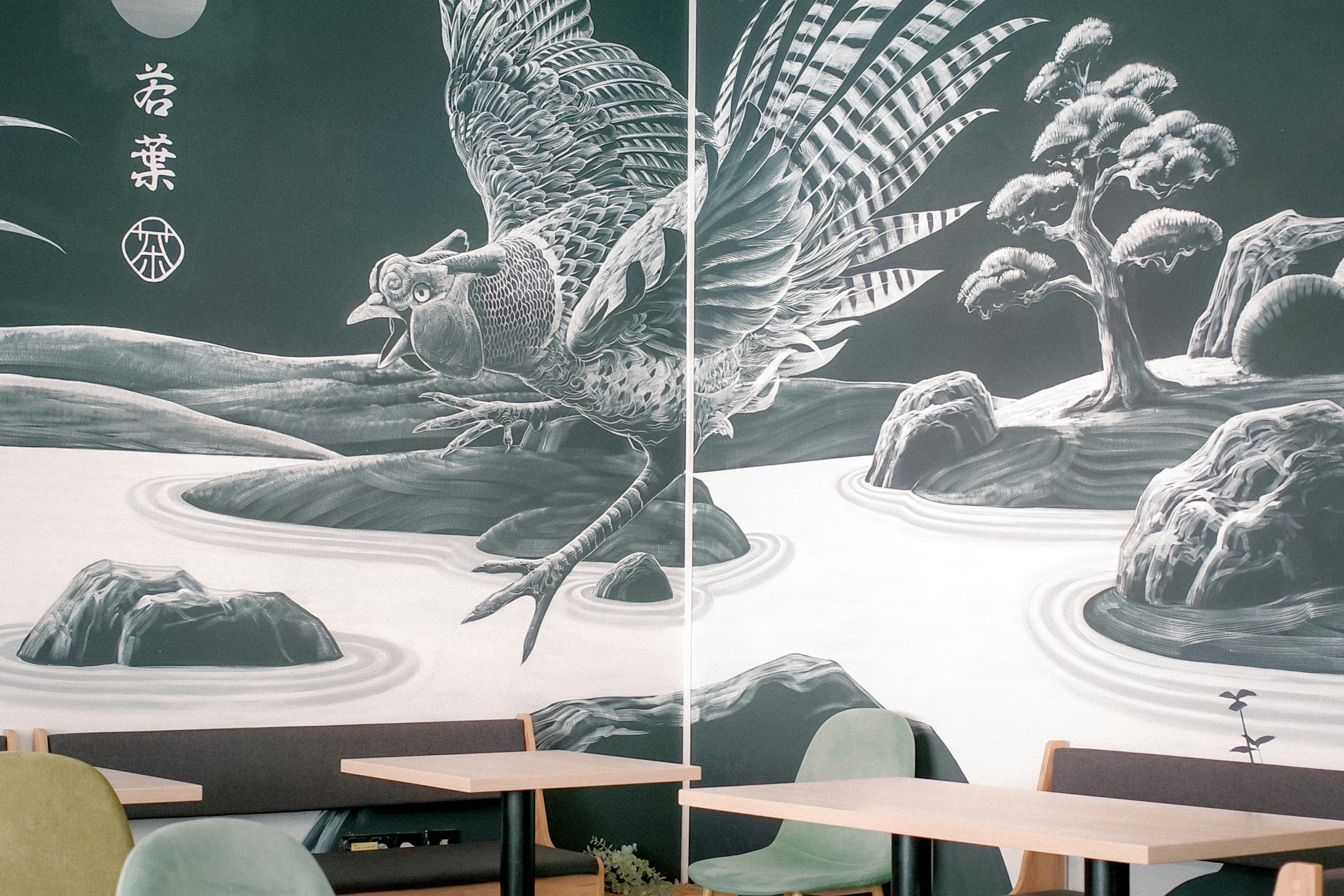 Wall art features a stylized bird and landscape.