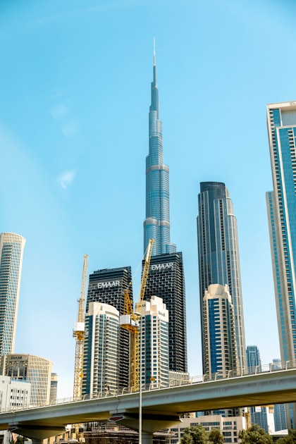 Dubai skyline in blue dusk light behind the Burj Khalifa, representing UAE holding and asset structures