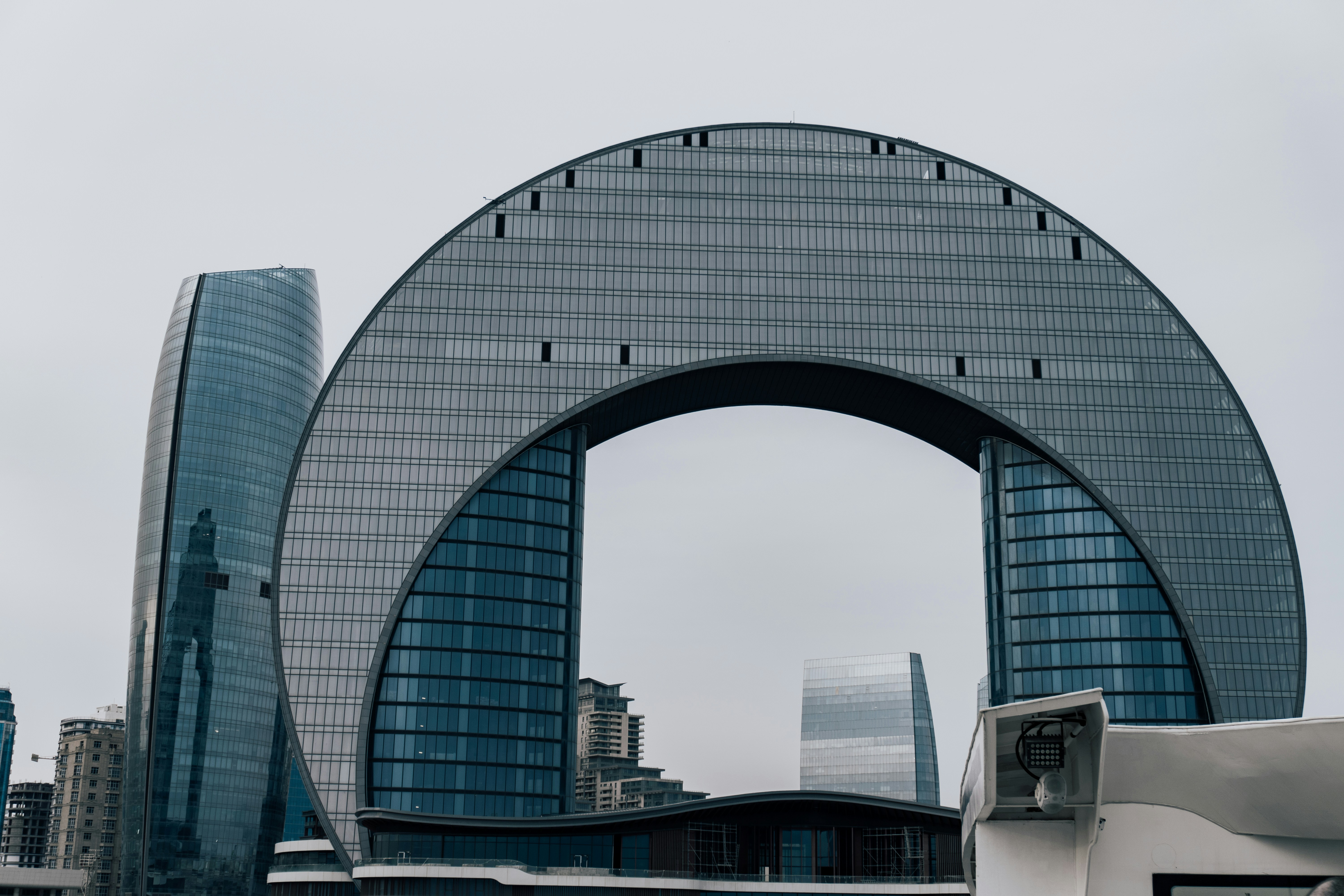 Modern architecture with a large archway.