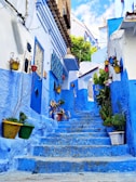 Blue alleyway with steps in a moroccan town.