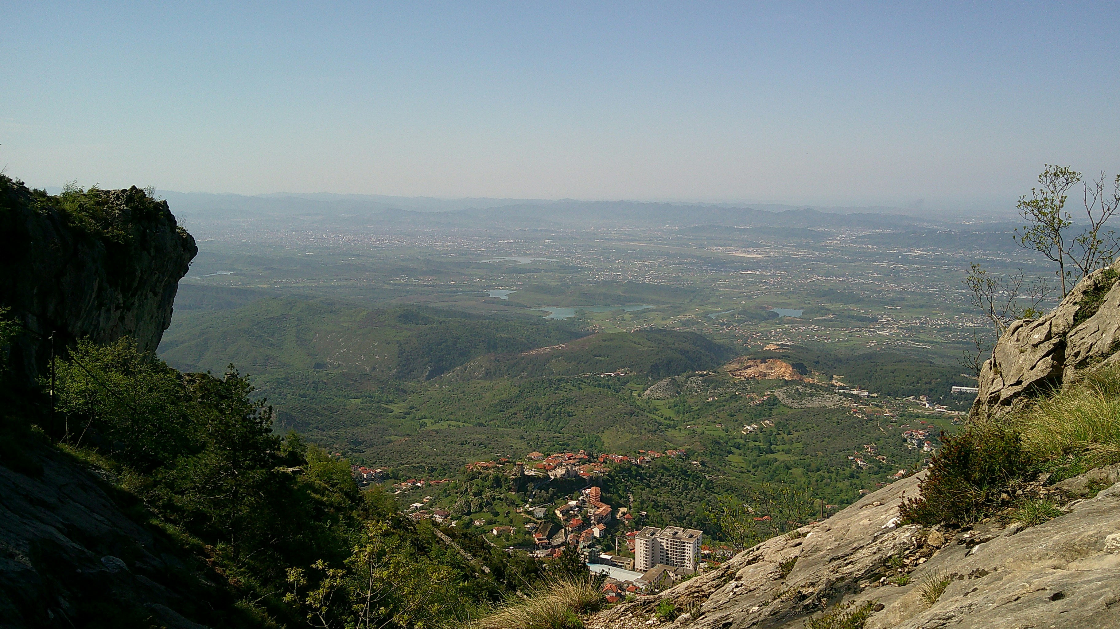 A scenic view from a mountain over a valley.