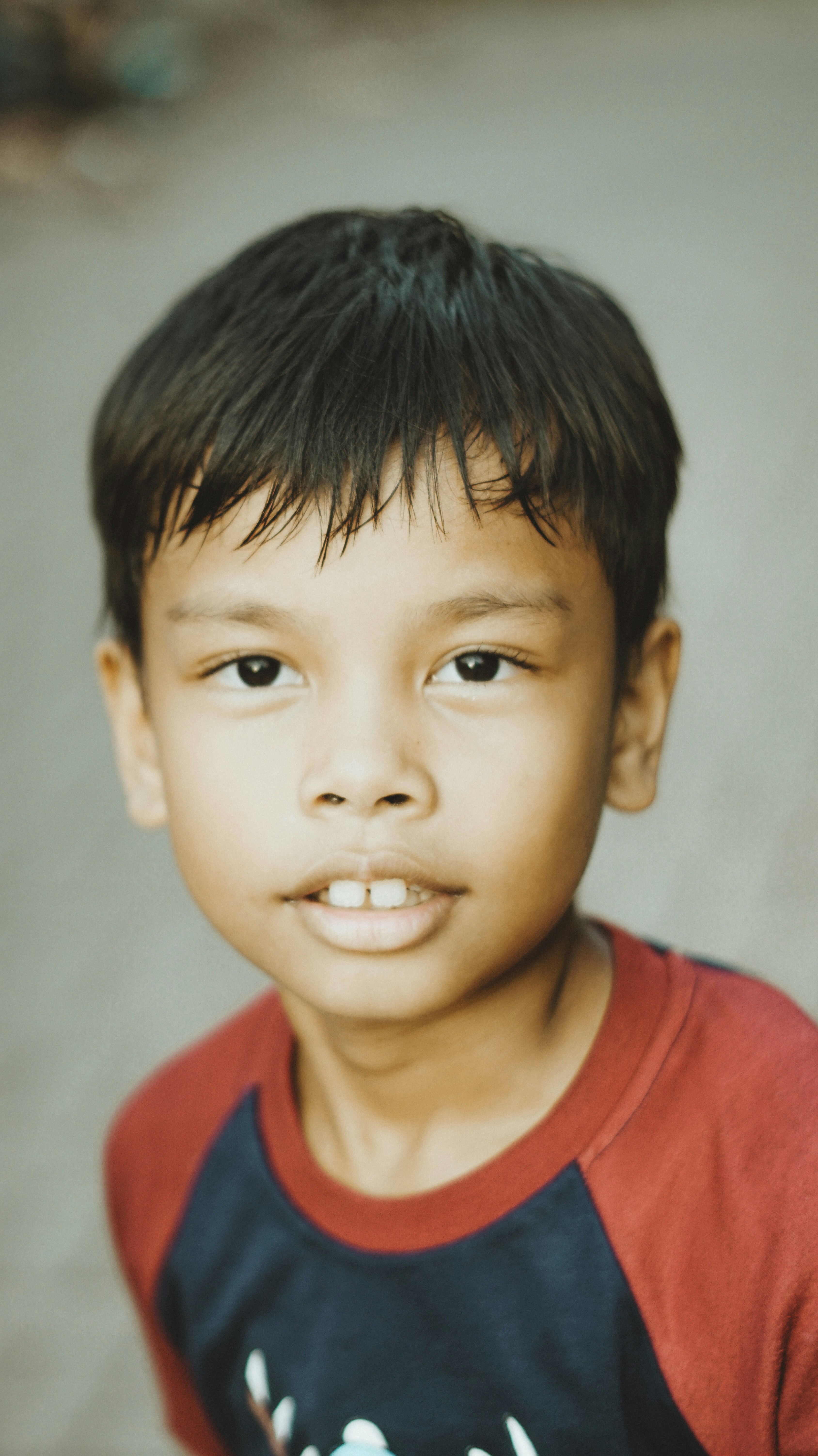 A young boy poses for the camera.