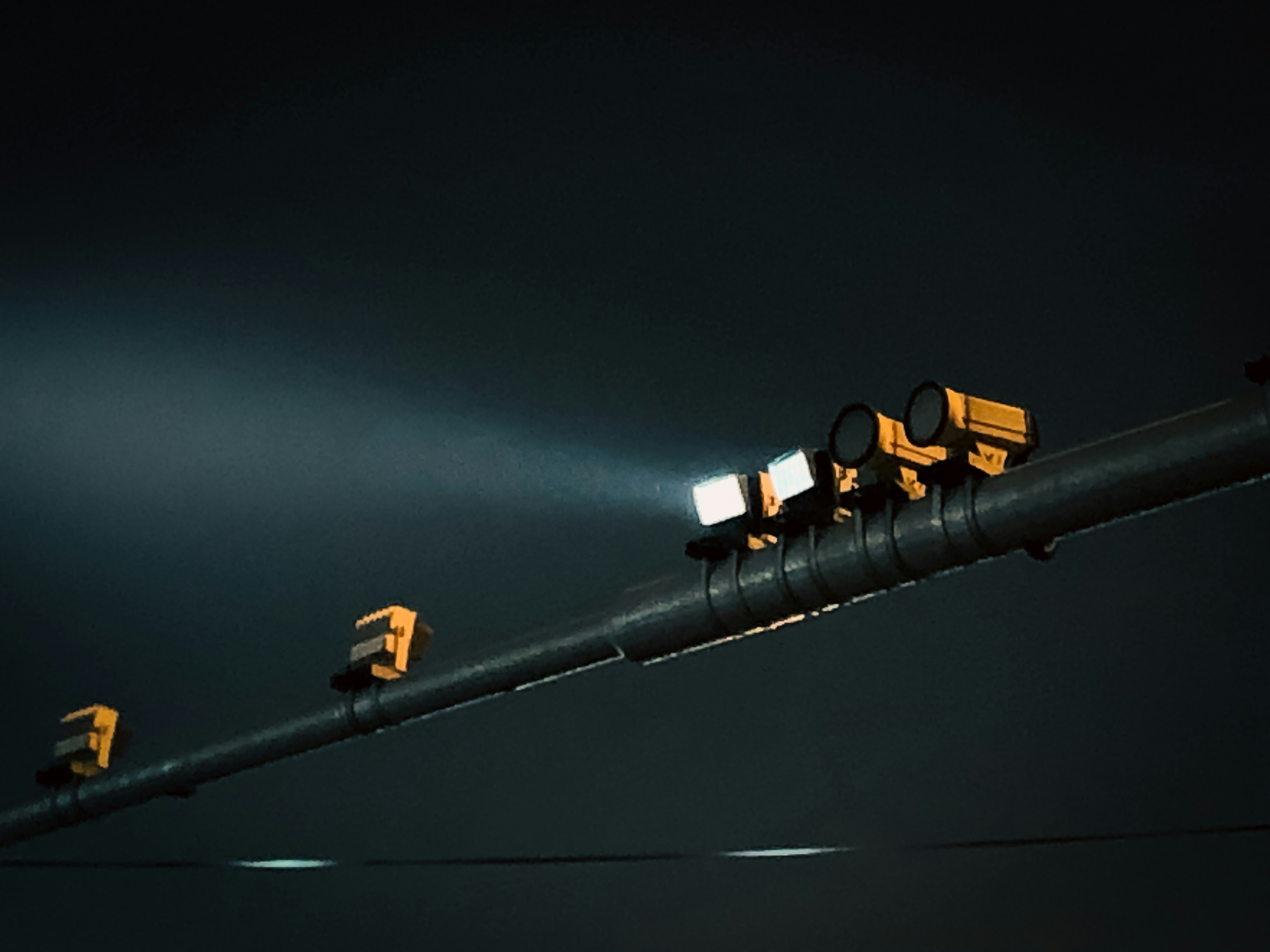 The light of traffic lights lighting the hazy night air