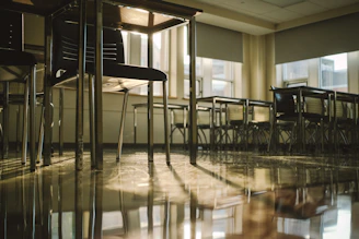 Empty classroom bathed in sunlight.