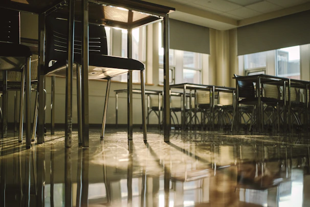 Empty classroom bathed in sunlight.