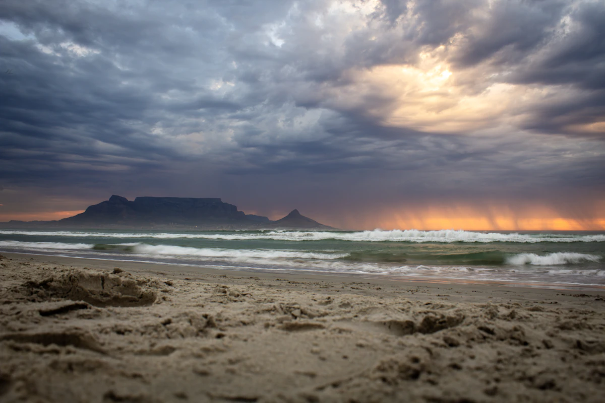 Sunset over the ocean with Table Mountain