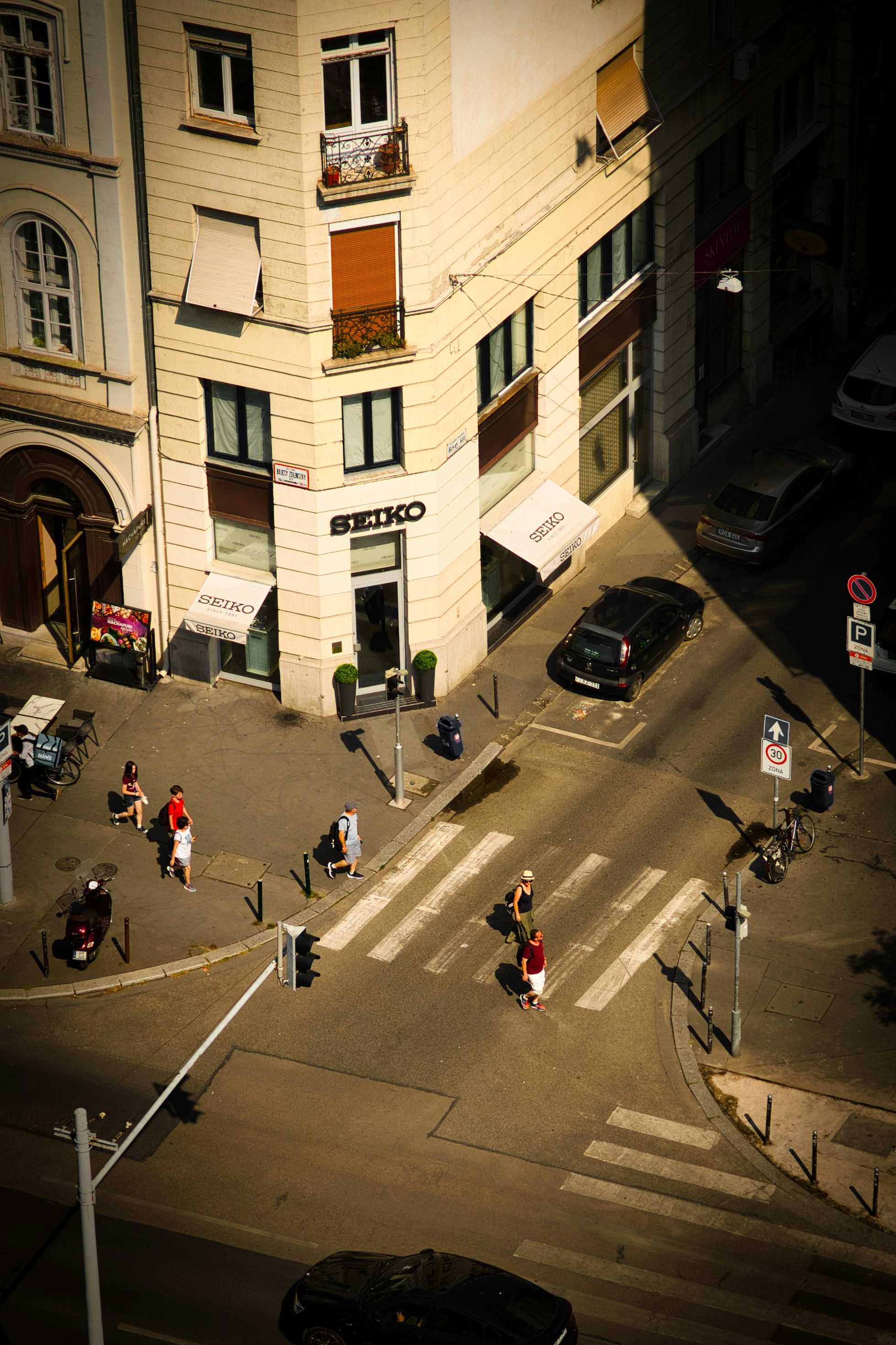 An aerial view of a city intersection.