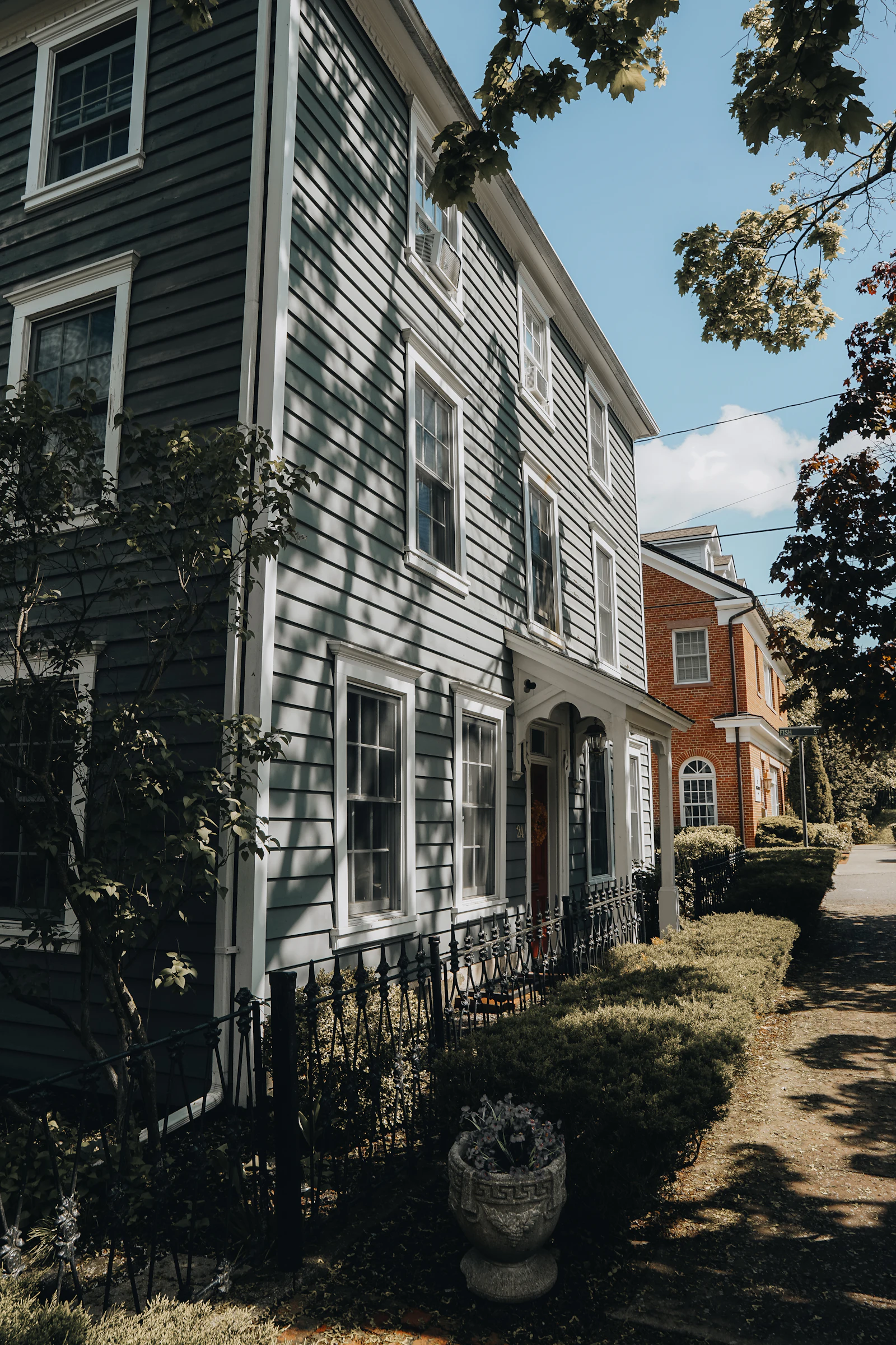 Historic homes along a sunny residential street