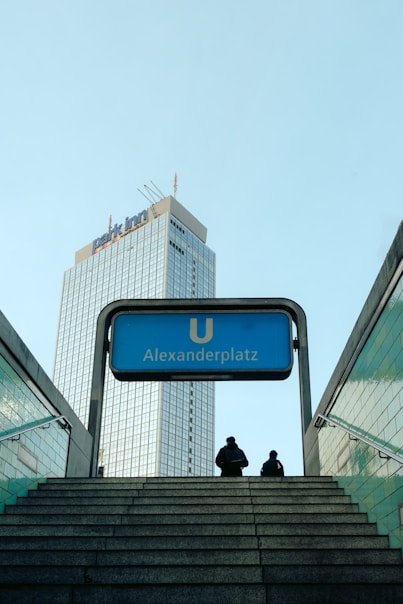 Alexanderplatz subway entrance with a large building.