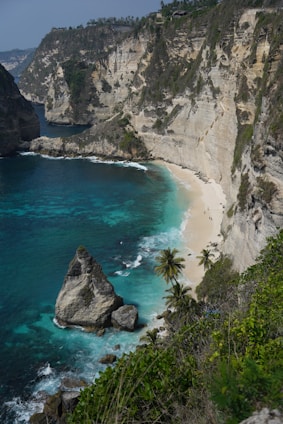 Turquoise water meets a beautiful, secluded beach.