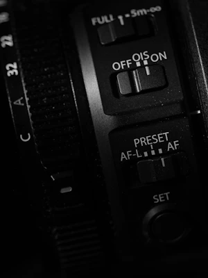 Camera lens controls and switches are visible.
