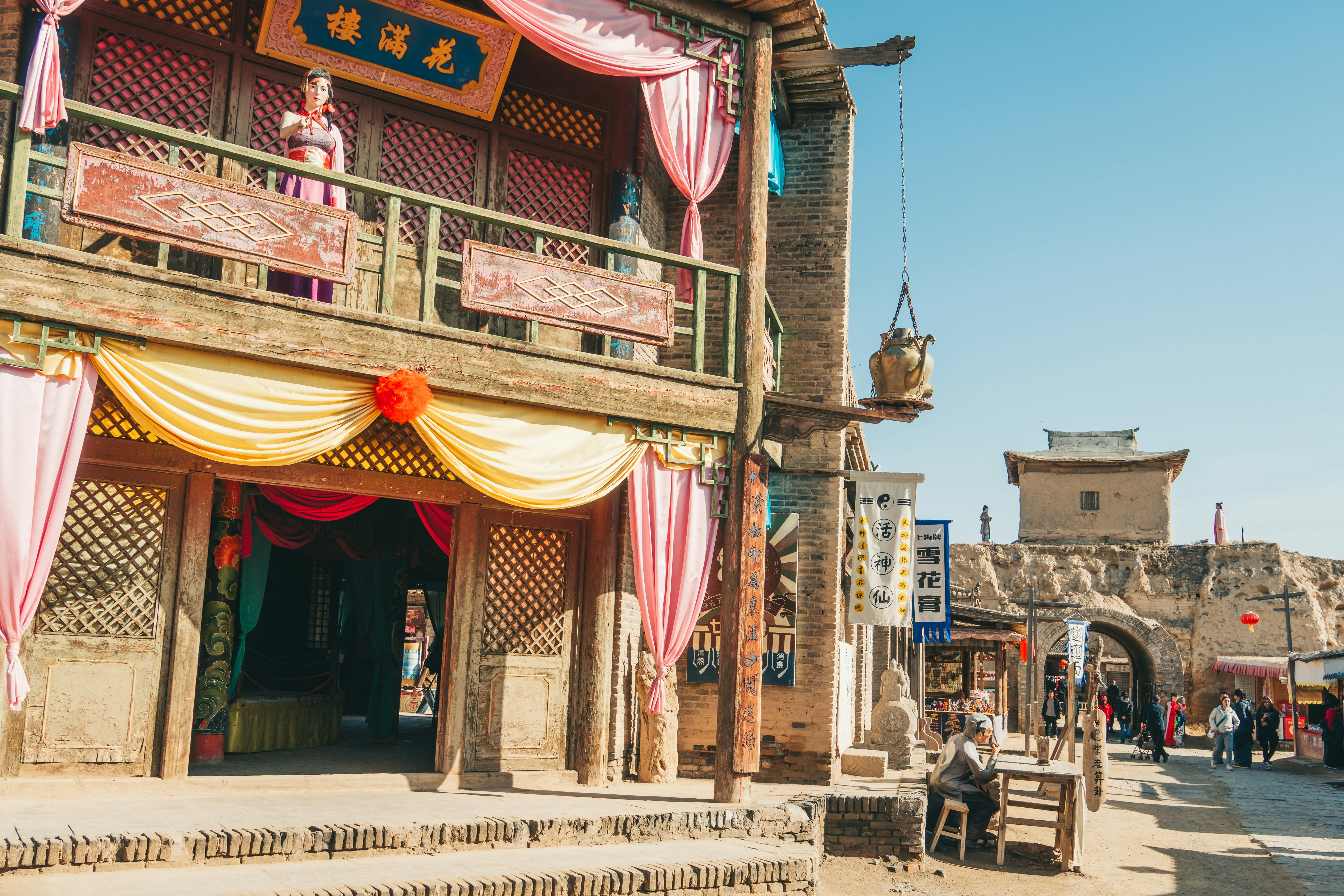 A traditional chinese street with buildings.
