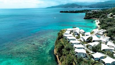 A resort sits on a lush cliffside.