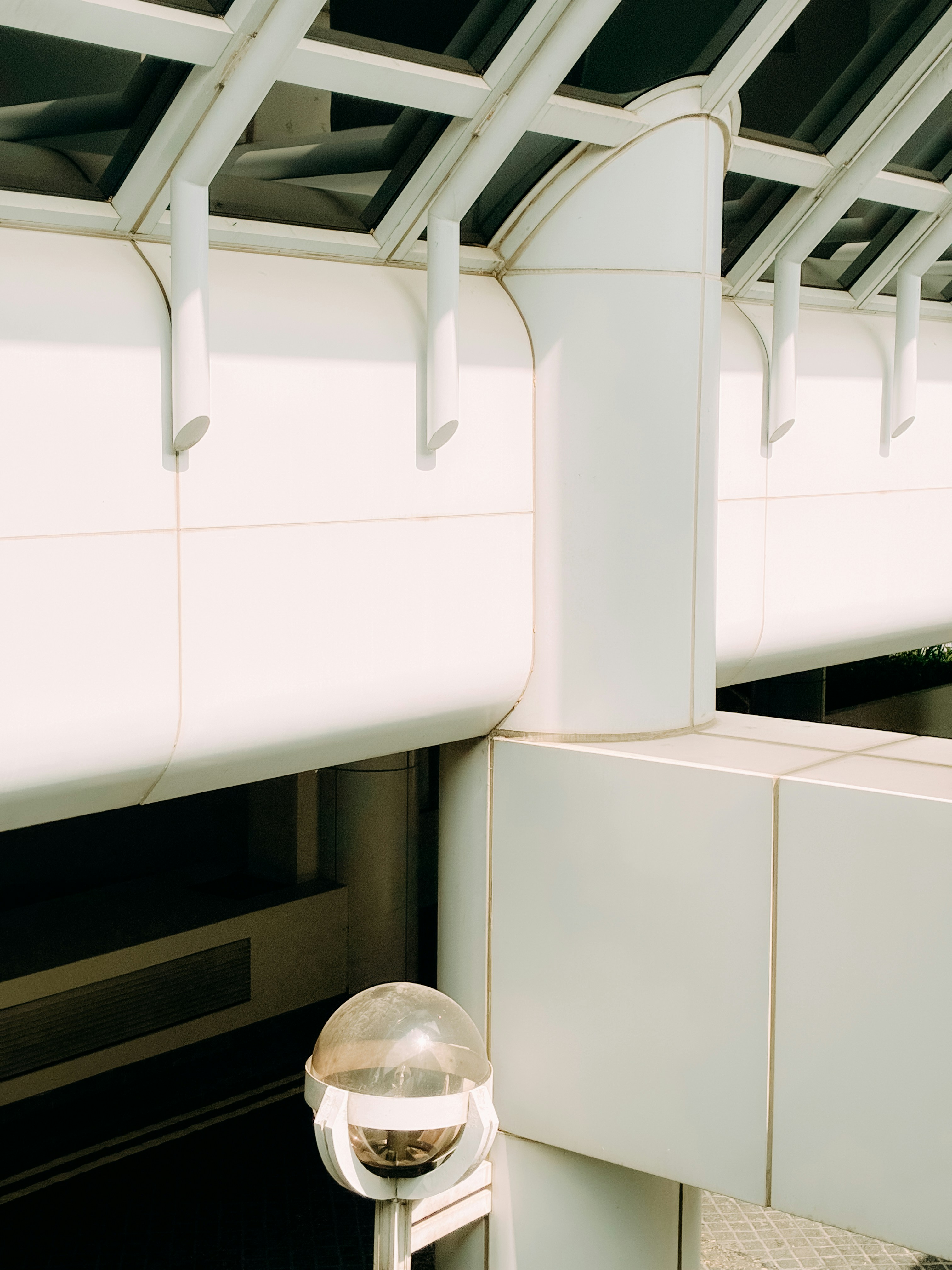 Modern white architecture with geometric shapes.