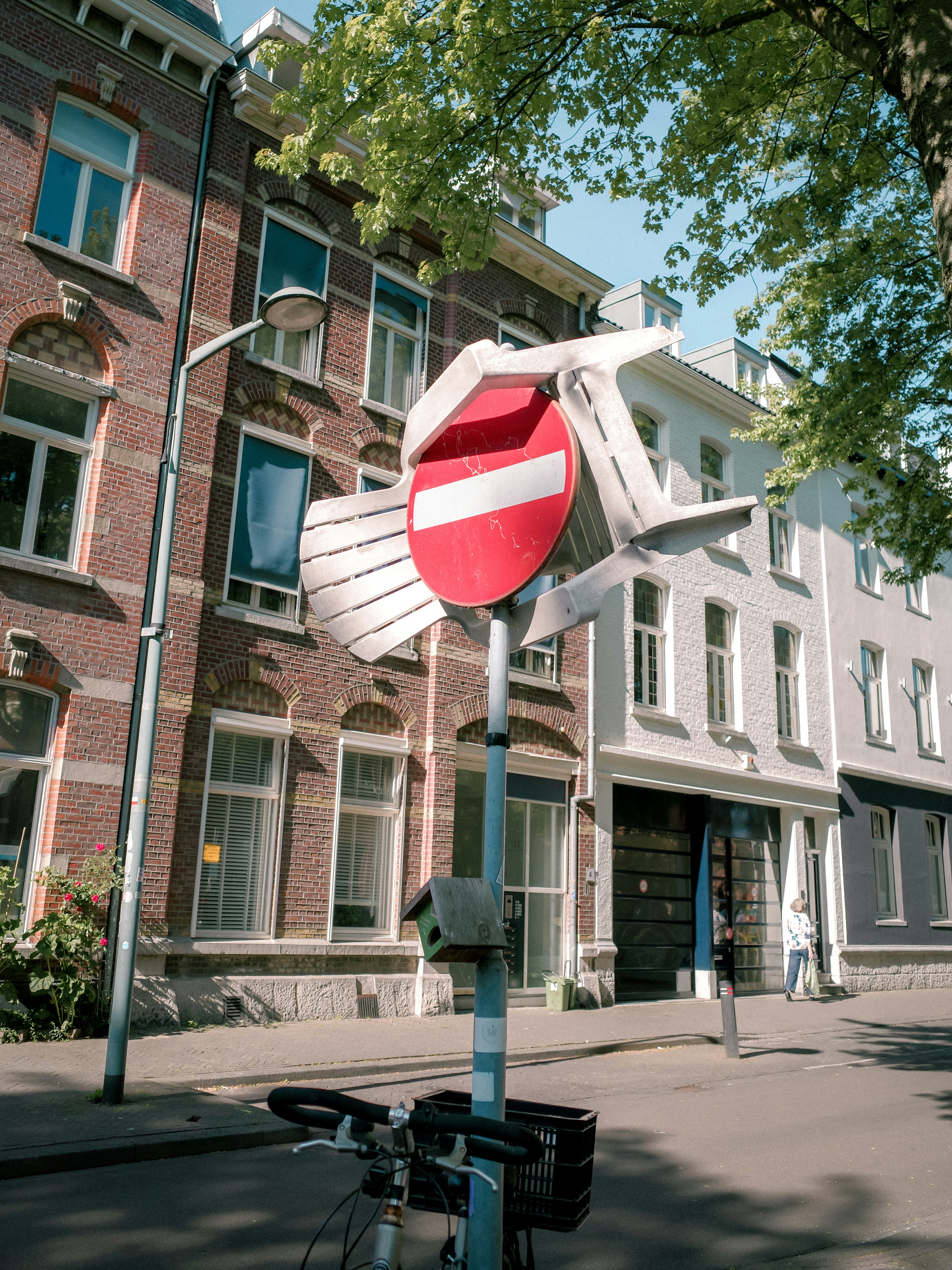 No entry sign stands on a city street. photo – Free Europe Image on ...